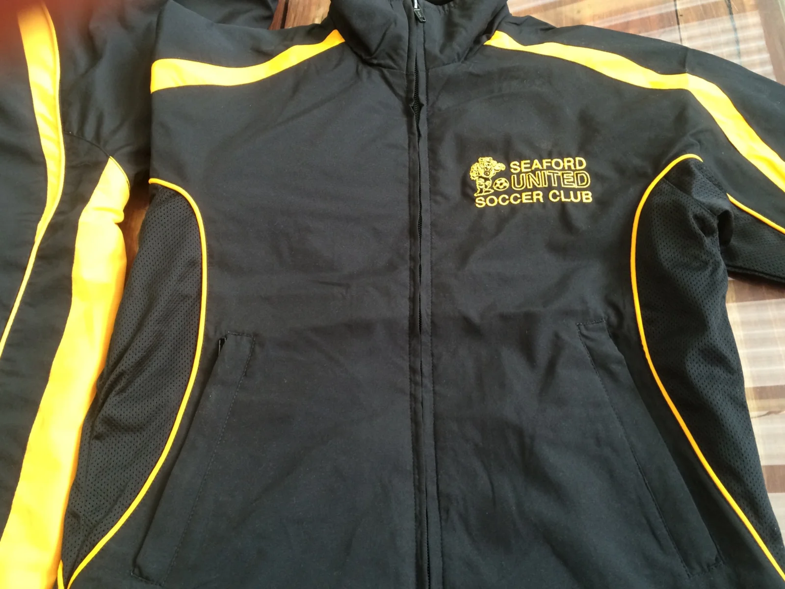 Seaford United Soccer Club embroidered black and yellow jacket