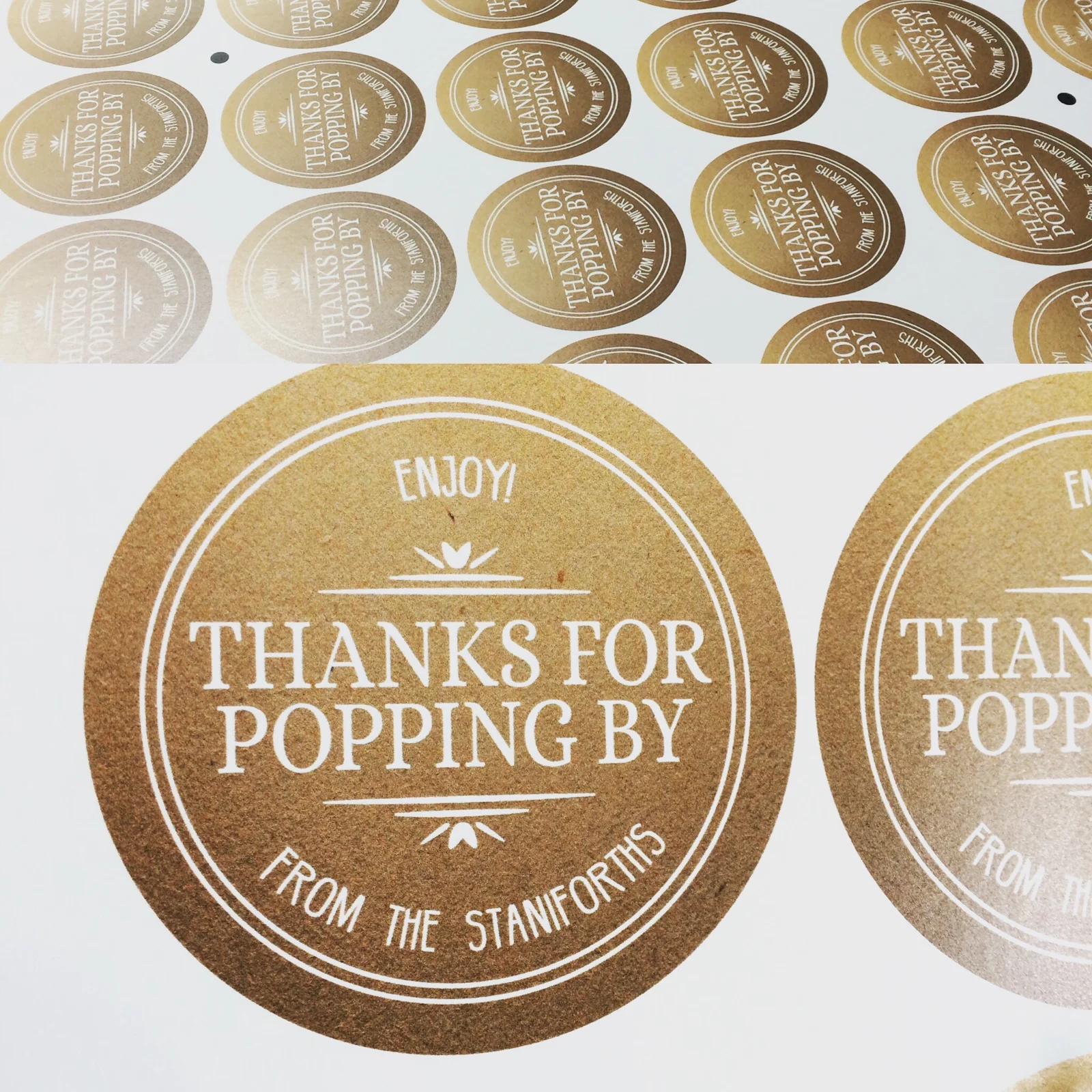 Round gold thank-you labels printed on a sheet