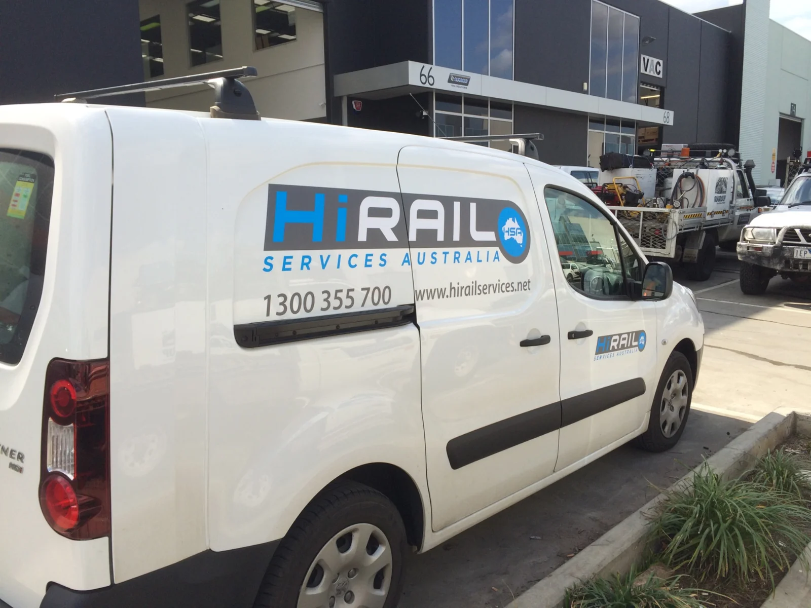 Hi Rail branded white work van