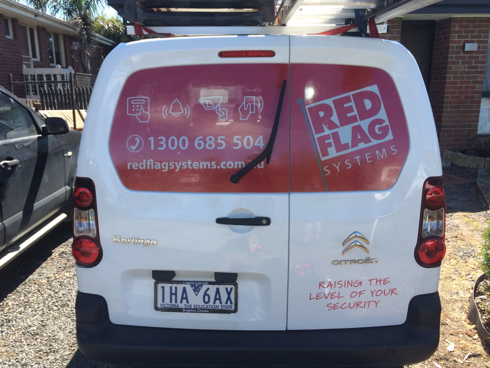 Rear graphics on a Red Flag Systems van